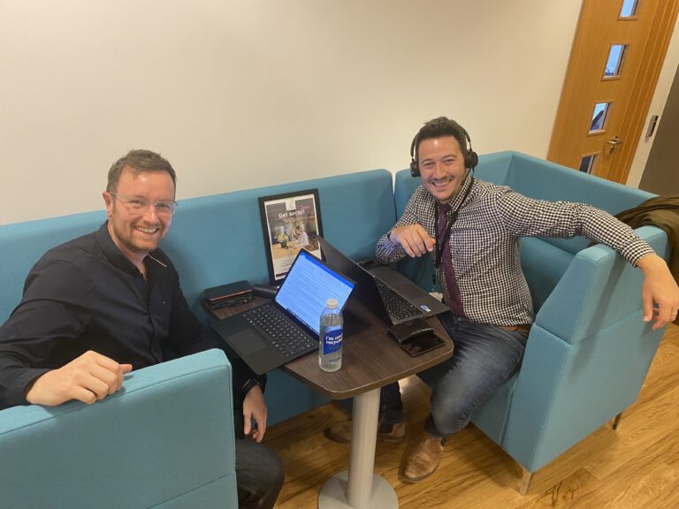 Image of two mtc. colleagues