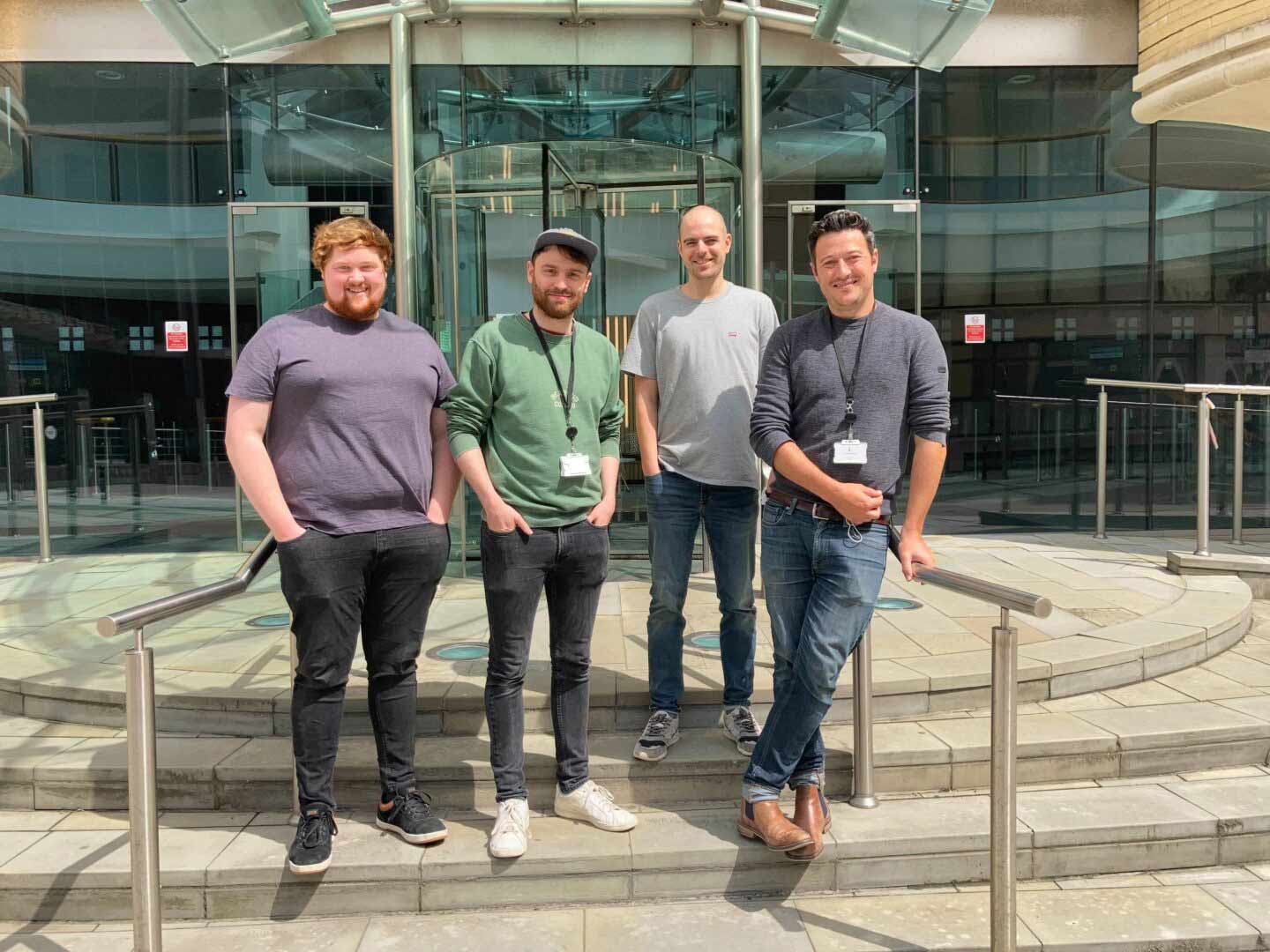 mtc staff photo outside their offices